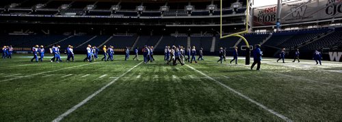 RUTH BONNEVILLE / WINNIPEG FREE PRESS

Winnipeg Blue Bombers make their way off the field after theirt walk-thru practice at Investors Group Stadium Friday.  

Oct 27, 2017