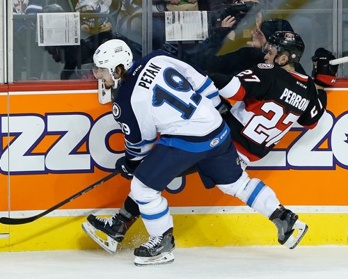 JOHN WOODS / WINNIPEG FREE PRESS
Manitoba Moose Nic Petan (19) checks Belleville Senators' Francis Perron (27) during first period AHL action in Winnipeg on Friday, October 27, 2017.
