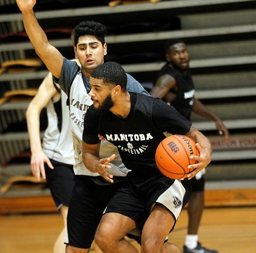 PHIL HOSSACK / WINNIPEG FREE PRESS  - Bison  Justus Alleyne works his way around a simulated defence Tuesday at the team workout. See Mike Sawatzsky story.  - Oct 31, 2017