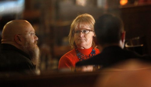 PHIL HOSSACK / WINNIPEG FREE PRESS  - Kevin Tengesdal, longtime LGBTTQ advocate (left) and Jamie Stewart frame Janet Michelson in a downtown Bismark eatery. See Melissa Martin feature. - Oct 25, 2017