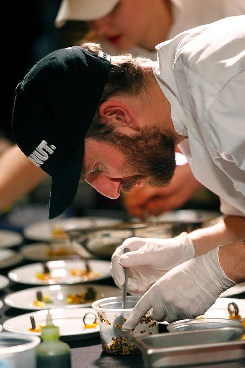 PHIL HOSSACK / WINNIPEG FREE PRESS  - Paul Ormond adds the finishing touches to plates at the Gold Medal Plates event Wednesday evening at the RBC Convention Centre. See release. - November 1, 2017