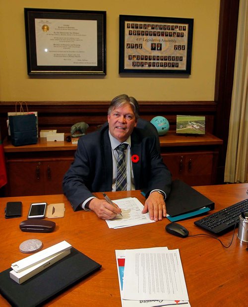 NADIA MINKEVICH / WINNIPEG FREE PRESS
Take Our Kids to Work Day  - Minister of Education and Training Ian Wishart poses for a photo in his office after being interviewed. Nov. 1, 2017