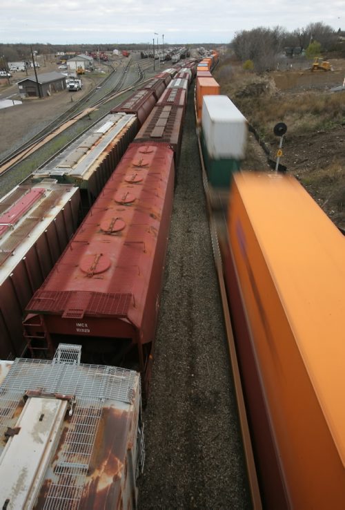 Brandon Sun A long trains pulls out of the Canadian Pacific Rail yard on Wednesday afternoon. (Bruce Bumstead/Brandon Sun)