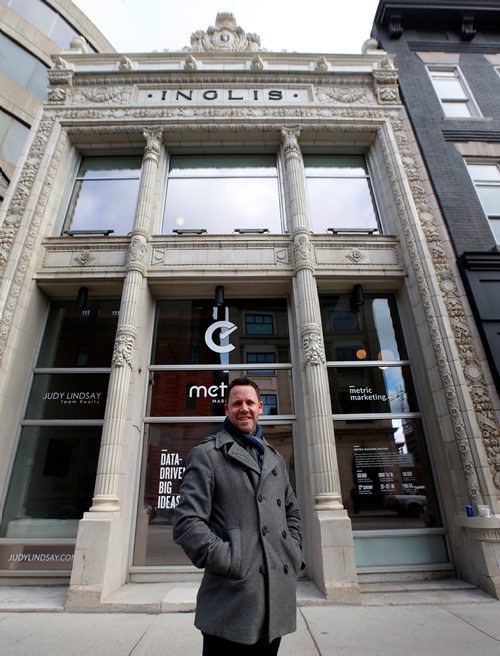 WAYNE GLOWACKI / WINNIPEG FREE PRESS

REAL ESTATE COLUMN. John McDonald, pres. & CEO Metric Marketing in front of their historic Inglis building at 291 Garry St. The company just completed the restoration of the terr-cotta façade of the two-storey building.Murray McNeill  story   Nov.2  2017