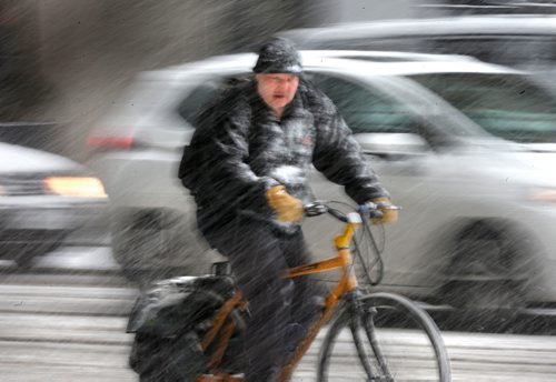 WAYNE GLOWACKI / WINNIPEG FREE PRESS

With a snowfall warning issued that up to 10cm could accumulate, it wasnt an ideal day to cycle in downtown Winnipeg Saturday afternoon.  Nov. 4 2017