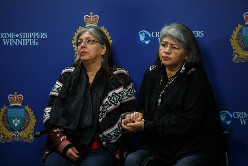 MIKE DEAL / WINNIPEG FREE PRESS
Lydia Pratt (left) quietly holds back her emotions the best she can during a press conference at the Police HQ the day before the third anniversary of when her son Colten Pratt went missing. She attended the press conference with Jacqueline Daniels (right), Coltens Pratt's aunt.
171106 - Monday, November 06, 2017.