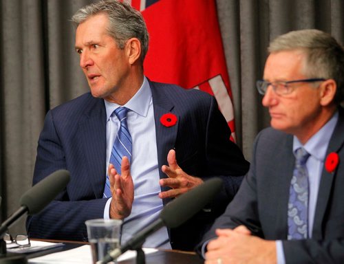 BORIS MINKEVICH / WINNIPEG FREE PRESS
Province announces hybrid model for distribution and retail of cannabis in room 68 at the Legislature. From left, Premier Brian Pallister and Trade Minister Blaine Pedersen. Nov. 7, 2017