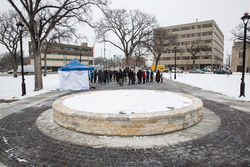MIKE DEAL / WINNIPEG FREE PRESS
A large circular snow filled flower garden representing the highest point on Vimy ridge known as the Pimple is part of the newly restored Vimy Ridge Memorial Park 44th Battalion monument and plaza at Portage Avenue and Canora Street.
171108 - Wednesday, November 08, 2017.