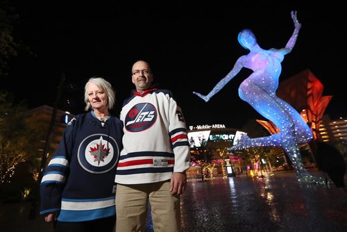 TREVOR HAGAN / WINNIPEG FREE PRESS
Kathy and Jack Swar, from Winnipeg, near the Bliss Dance Statue in front of T-Mobile Arena, are among many who came Las Vegas to watch the Winnipeg Jets take on the Vegas Golden Knights, Wednesday, November 8, 2017.
