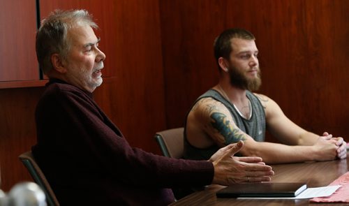 WAYNE GLOWACKI / WINNIPEG FREE PRESS 

At left, John Hutton, executive director of The John Howard Society of Manitoba Inc. speaks about their Bail Assessment, Support & Supervision Program. Cody Udey,28, has been benefiting from the program.   Ryan Thorpe story. Nov. 9 2017