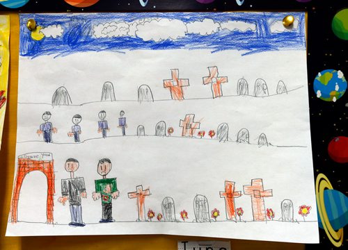 WAYNE GLOWACKI / WINNIPEG FREE PRESS 

A drawing by seven year old  Gerald, a student at Tyndall Park Community School to mark Remembrance Day this weekend. All through the school,  hallways displayed the students Remembrance Day art work that included poppies, cemeteries and battle scenes.   Nov. 9 2017