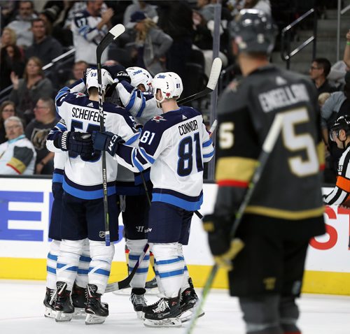 TREVOR HAGAN / WINNIPEG FREE PRESS
The Winnipeg Jets' celebrate after Patrik Laine (29) scored against the Vegas Golden Knights during second period NHL action at T-Mobile Arena in Las Vegas, Friday, November 10, 2017.