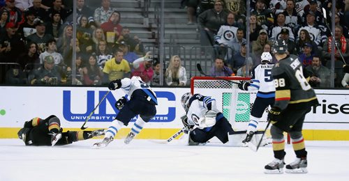 TREVOR HAGAN / WINNIPEG FREE PRESS
Vegas Golden Knights' James Neal (18) scores as he falls to the ice while playing against the Winnipeg Jets' during second period NHL action at T-Mobile Arena in Las Vegas, Friday, November 10, 2017.