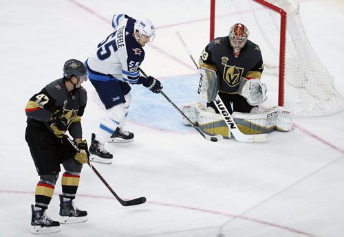 TREVOR HAGAN / WINNIPEG FREE PRESS
Winnipeg Jets' Mark Scheifele (55) tries to deflect a shot in front of Vegas Golden Knights' goaltender Maxime Legace (33), during third period NHL action in Las Vegas, Friday, November 10, 2017.