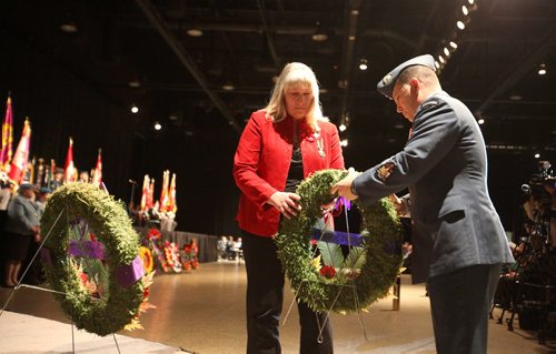 RUTH BONNEVILLE / WINNIPEG FREE PRESS

Wendy Hayward, mother of Corporal James Arnal who was killed while serving Canada in Afghanistan, lays wreath for memorial cross mother during the annual Winnipeg Remembrance Day Service, at RBC Convention Centre Saturday.  

See Ryan Thorpe story. 

Nov 11, 2017