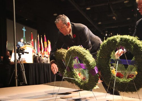 RUTH BONNEVILLE / WINNIPEG FREE PRESS

Premier Brian Pallister lays wreath in front of cenotaph  during the annual Winnipeg Remembrance Day Service, at RBC Convention Centre Saturday.  

See Ryan Thorpe story. 

Nov 11, 2017