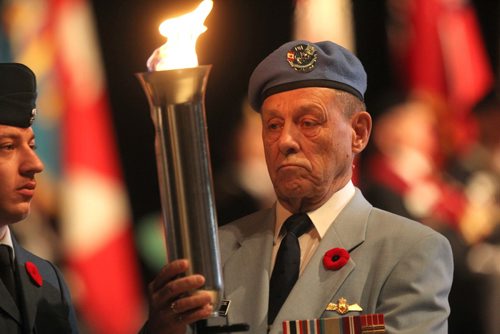 RUTH BONNEVILLE / WINNIPEG FREE PRESS


Canadian military service personal holds torch during the annual Winnipeg Remembrance Day Service, at RBC Convention Centre Saturday.  

See Ryan Thorpe story. 

Nov 11, 2017