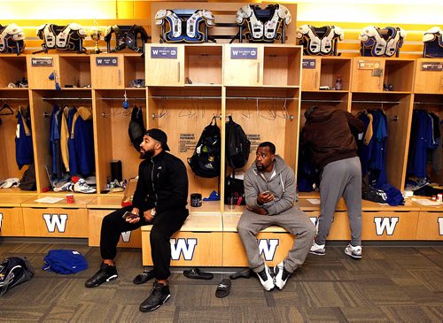 PHIL HOSSACK / WINNIPEG FREE PRESS  - Winnipeg Blue Bombers Left to right, Frank Renaud, Sach Bauman and Myles White in front of their lockers Monday morning the day after......Sorry couldnt find a roster with full names of these guys....- Jeff Hamilton story. - November 13, 2017