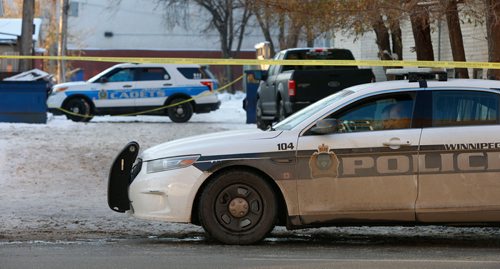 WAYNE GLOWACKI / WINNIPEG FREE PRESS 

Winnipeg Police have a crime scene on McMicken St. at Ellice Ave. taped off Monday morning. A 16-year-old boy was attacked by a number of suspects and stabbed Sunday night, he was transported to hospital where he remains in critical condition. Nov. 13  2017