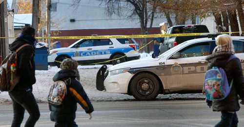 WAYNE GLOWACKI / WINNIPEG FREE PRESS 

Winnipeg Police have a crime scene on McMicken St. at Ellice Ave. taped off Monday morning. A 16-year-old boy was attacked by a number of suspects and stabbed Sunday night, he was transported to hospital where he remains in critical condition. Nov. 13  2017