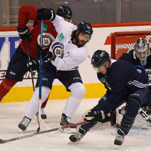 WAYNE GLOWACKI / WINNIPEG FREE PRESS 

Winnipeg Jets centre Mathieu Perreault  #85 in white jersey  at the practice Monday morning in Bell MTS Place. The player at right is Brandon Tanev  #13 .   Jason Bell story   Nov. 13  2017