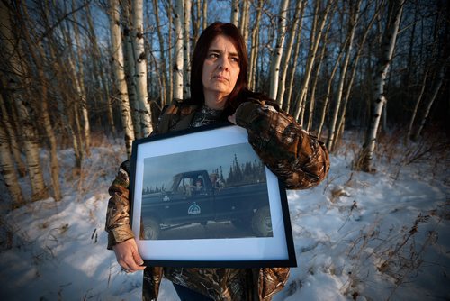 JOHN WOODS / WINNIPEG FREE PRESS
Nicole Zahorodny, a childhood friend of Kerrie Ann Brown, holds a photo of them as teens at Missi Falls just north of Thompson Monday, November 13, 2017. Kerrie Ann Brown was killed in 1986 and her murder has remained unsolved and is considered a cold case.
