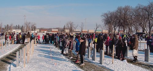 Canstar Community News Nov. 6, 2017 - Approximately 500 Grade 6 students from River East-Transcona School Division paid tribute to fallen soldiers and veterans at the No Stone Left Alone event at the Transcona Cemetery. (SHELDON BIRNIE/CANSTAR/THE HERALD