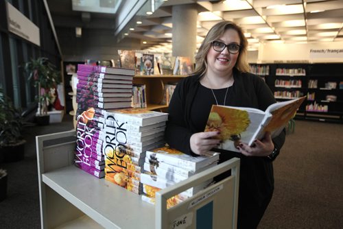 RUTH BONNEVILLE / WINNIPEG FREE PRESS


Feature: 100th anniversary of World Book Encyclopedia.  Millennium Library collections librarian Terri Wiest,  with 2015 and 2016 volumes of the books in the children's area of the library.  
Also, photos of encyclopedias stacked on a cart in the children's department and of three-year-old Dixa Pokharel looking through the book with her mother Daya Shrestha in the library.  

See story by  Dave Sanderson.
Nov 14, 2017