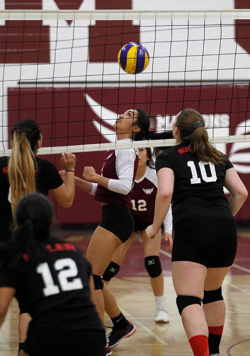 PHIL HOSSACK / WINNIPEG FREE PRESS  - Daniel McIntyre's Allison Conception plans her next move against Sisler's Trojans Tuesday night after her hit was blocked and returned. The Maroons took the match 3-0 on their home court.  - November 14, 2017