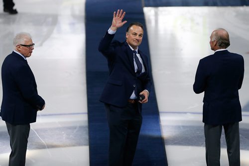 JOHN WOODS / WINNIPEG FREE PRESS
Dale Hawerchuk is joined by Ulf Nilsson (L) and Anders Hedberg (R) as he is inducted into the Winnipeg Jets Hall of Fame prior to a Winnipeg Jets game against the Arizona Coyotes Tuesday, November 14, 2017.