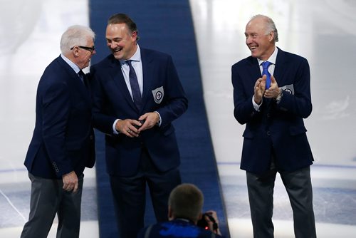 JOHN WOODS / WINNIPEG FREE PRESS
Dale Hawerchuk is joined by Ulf Nilsson (L) and Anders Hedberg (R) as he is inducted into the Winnipeg Jets Hall of Fame prior to a Winnipeg Jets game against the Arizona Coyotes Tuesday, November 14, 2017.