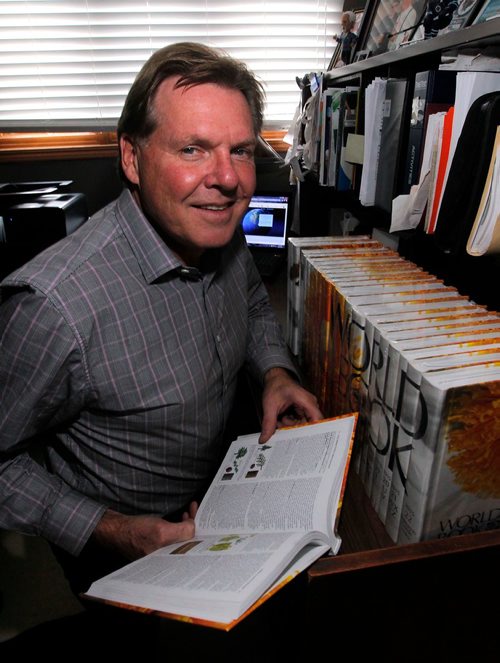 BORIS MINKEVICH / WINNIPEG FREE PRESS
Kerry Kuran is one of the last encyclopedia salesperson standing. 100-yr anniversary of World Book encyclopedias. Photo taken at his home office. Dave Sanderson story. Nov. 15, 2017