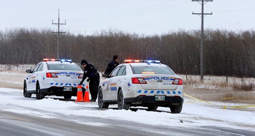 WAYNE GLOWACKI / WINNIPEG FREE PRESS 

RCMP officers at a taped off scene on Highway 6 just south of St. Laurent, Mb. Wednesday morning. This is the site the police officer was over powered Tuesday night. Kevin Rollason  story   Nov. 15  2017