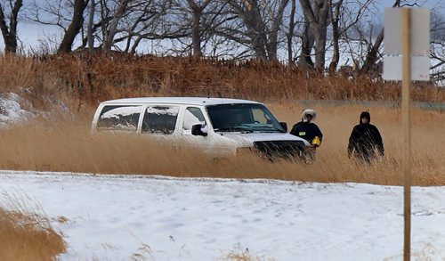 WAYNE GLOWACKI / WINNIPEG FREE PRESS

Investigators by the RCMP vehicle in the ditch along  Highway 417 near Lake Manitoba First Nation where a man was shot early Wednesday morning..Kevin Rollason  story   Nov. 15  2017