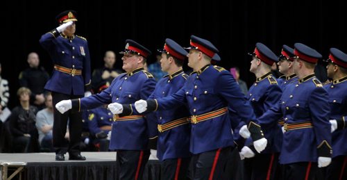 BORIS MINKEVICH / WINNIPEG FREE PRESS
The Graduation Ceremony for Winnipeg Police Service Recruit Class #160 took place at the RBC Convention Centre, 3rd Floor, Hall A, 375 York Avenue, Winnipeg, MB, today. Police Chief Danny Smyth, left, salutes the new grads as they march past him. STANDUP PHOTO. Nov. 17, 2017