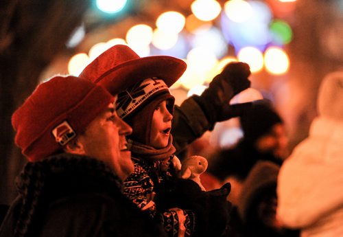 A young boy stares in disbelief as rolls in on his float down Portage Avenue at the 2017 Santa Claus Parade Saturday evening. November 18, 2017. Mike Sudoma /  Winnipeg Free Press