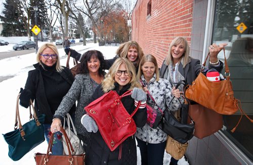 RUTH BONNEVILLE / WINNIPEG FREE PRESS

Volunteers Column: Handbags of Hope 
Fun photo of group of women volunteers hoping to collect 1,000 gently-used purses so they can fill them with useful items (warm mitts or gloves, tissues, soap, deodorant, etc.) and donate then to organizations that help women in Winnipeg who are facing hardship.

Names of women in the photo from back left: Tracey Kleysen (black jacket), Cathy Jowett (Knit jacket), Silke Blaine, Shauna Angers (grey), Karen Burns (black & white) and Sharon Evans (centre red purse).  

Sharon, 53, and Cathy, 52, are two of the women behind Handbags of Hope with the help of the others.  

Sharon is the main source in the column.


Aaron Epp
Volunteers columnist, Winnipeg Free Press

Nov 18, 2017