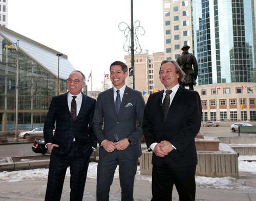 WAYNE GLOWACKI / WINNIPEG FREE PRESS

  Mayor Brian Bowman in centre with Bobby,left, and his brother Jon Brown were presented the Organizational Community Service Award for their family run business Leon A. Brown Ltd.   Since 1927,  Leon A. Brown Ltd. has been at Portage and Main and over the years has grown into a diverse company with film studios, residential and industrial development in Toronto, Vancouver, and Winnipeg. Many of The Exchange District's earliest revitalizations were the work of Leon A Brown Ltd. Including: 374 Donald, 376 Donald, 44 Princess, 460 Main, 111 Pacific, 109 Alexander and 92 Gomez. The company  supports a wide range of charitable causes including: The Winnipeg Foundation, UJA, Bnai Brith Camp, The Winnipeg Art Gallery, Canadian Museum of Human Rights and Nuit Blanche. At the ceremony held  Tuesday in the Bank of Montreal at Portage & Main they announced a donation to Art City and their support to open Portage and Main to pedestrians. Nov. 21  2017