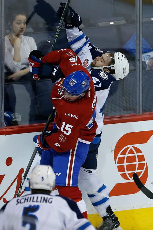 JOHN WOODS / WINNIPEG FREE PRESS
Manitoba Moose Charles-David Beaudoin (47) gets checked by Laval Rocket's Thomas Edding (15) during first period AHL action in Winnipeg on Tuesday, November 21, 2017.