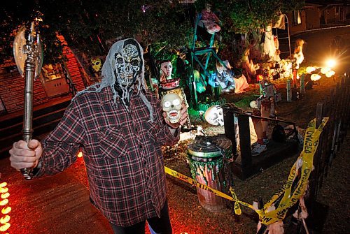 BORIS MINKEVICH / WINNIPEG FREE PRESS  081030 Darren Dudeck poses in front of the display his wife Darlene created for Halloween. The address is 998 Manahattan Ave.