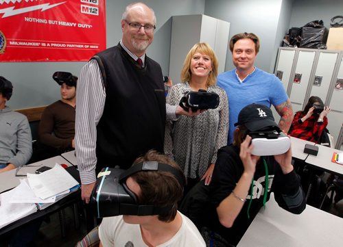 BORIS MINKEVICH / WINNIPEG FREE PRESS
Students training at the IBEW 2085 training facility for the first time will be using a virtual reality training application.  It was developed in cooperation with a bunch of local unions and funded by the WCB. In photo standing is WCB manager of research & workplace innovation program Bruce M Cielen, Manitoba Construction Sector Council Exec. Director Carol Paul, and IBEW Local union 2085 Dir. of apprenticeship & training vice president Chris Taran. MARTIN CASH STORY Nov. 22, 2017