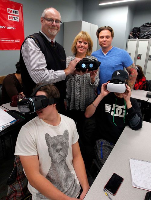 BORIS MINKEVICH / WINNIPEG FREE PRESS
Students training at the IBEW 2085 training facility for the first time will be using a virtual reality training application.  It was developed in cooperation with a bunch of local unions and funded by the WCB. In photo standing is WCB manager of research & workplace innovation program Bruce M Cielen, Manitoba Construction Sector Council Exec. Director Carol Paul, and IBEW Local union 2085 Dir. of apprenticeship & training vice president Chris Taran. MARTIN CASH STORY Nov. 22, 2017