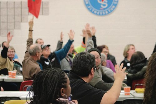 Canstar Community News Nov. 14, 2017 - Many people raised their hands to show opposition to the North District Police Station being built at the Old Exhibition Grounds. (LIGIA BRAIDOTTI/CANSTAR COMMUNITY NEWS/TIMES)