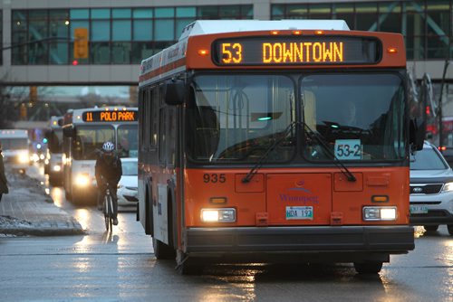 RUTH BONNEVILLE / WINNIPEG FREE PRESS

Transit fares will rise after the mayor tabled the City budget today.  Generic Photos of busses in downtown Winnipeg.  
See story.  
Nov 22, 2017