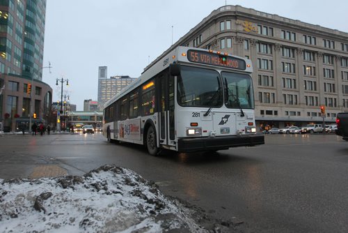 RUTH BONNEVILLE / WINNIPEG FREE PRESS

Transit fares will rise after the mayor tabled the City budget today.  Generic Photos of people busses in downtown Winnipeg.  
See story.  
Nov 22, 2017