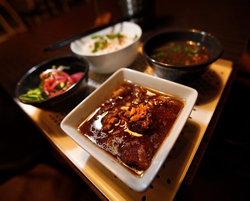 PHIL HOSSACK / WINNIPEG FREE PRESS
The "Beef Pares Platter" featuring beef, broth, garlic Rice and Salad at the Mami Project, an Ellice ave Philippino Noodle House. See review.   - November 22, 2017