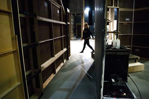 MIKE DEAL / WINNIPEG FREE PRESS
A stage crew member walks past walls being built for the show in a behind the scene look during the preparation for the Royal Manitoba Theatre Centre's production of A Christmas Carol.
171116 - Thursday, November 16, 2017.