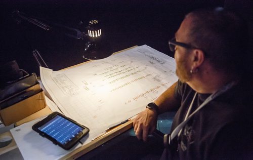 MIKE DEAL / WINNIPEG FREE PRESS
Claude Robert, Head Electrician, keeps track of all the lights being used during the show on paper in a behind the scene look during the preparation for the Royal Manitoba Theatre Centre's production of A Christmas Carol.
171116 - Thursday, November 16, 2017.