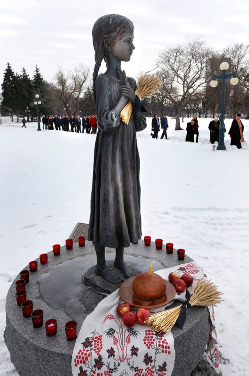 WAYNE GLOWACKI / WINNIPEG FREE PRESS

Monsignor Michael Buyochok leads the procession to The Bitter Memories Of Childhood monument on the Manitoba Legislative grounds for a ceremony Thursday to remember the Ukrainian famine genocide of 1932 to 1933.  During the Soviet governments regime, millions of Ukrainians starved to death during the Holodomor, which translates into death by hunger. Manitoba is among jurisdictions around the world that formally commemorate the Holodomor annually on the fourth Saturday of November, known in Manitoba as Ukrainian Famine and Genocide (Holodomor) Memorial Day. This year it takes place  on Nov. 25.  During Thursdays question period, Sport, Culture and Heritage Minister Cathy Cox introduced a moment of silence and stalks of wheat, tied with a black ribbon were placed on the desk of every member of the legislative assembly. See Manitoba Govt release story.  Nov. 23  2017