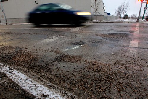 BORIS MINKEVICH / WINNIPEG FREE PRESS
$52.5 million set aside next year to tear up and rebuild eight heavily used routes and improve Portage and Main. Empress Street is set for $11.4 million of that for reconstruction between Portage Avenue and St. Matthews Avenue. Here is a photo that shows some of the road conditions on Empress near Maroons Road. ALDO SANTIN STORY Nov. 22, 2017
